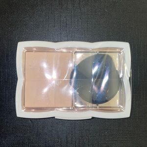 New w/ seal light powder by Flower beauty.